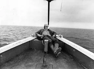 00088 Prints: Jack Charlton grabs a quick snooze whislt enjoying an afternoon fishing