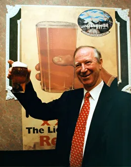 Jack Charlton with a pint of Nimmos XXXX at Castle Eden Brewery in January 1999