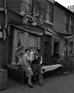 Jack Gardner with his wife and daughter at their home after the had beaten Bruce Woodcock