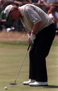 Jack Nicklaus Golfer attempts to putt the ball on the 18th green during the second day