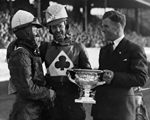 Speedway Prints: Jack Rowley of Manchester United presenting the cup to Speedway champion Jack Parker