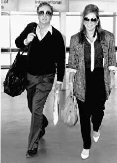 Jackie Collins Actress leaving heathrow airport on the same flight as Michael Caine