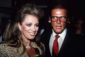 Occupation A Prints: Jackie Collins Author With Actor Roger Moore At The Launch Of Her New Book