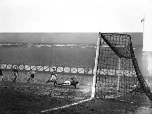 Portsmouth Prints: Jackie Milburn of Newcastle United scores a goal against Portsmouth. FA Cup Quarter-final