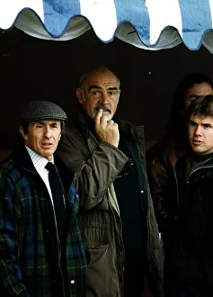 Jackie Stewart with actor Sean Connery at Gleneagles tartan jacket cap