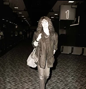 Bags Baggage Cases And Crates Prints: Jacqueline Bisset actress arrives at Heathrow Airport, July 1987