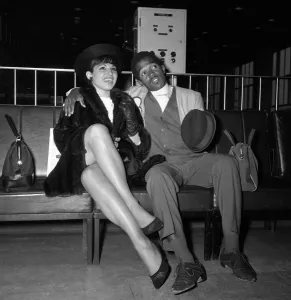 Jamaican musician Prince Buster with his friend Bridgetta Bond