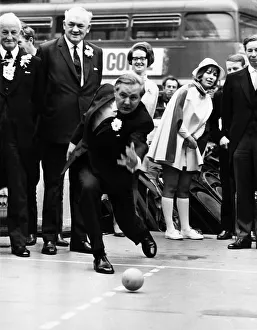 00156 Prints: James Callaghan Labour MP bowling in the street during the London Dairy Festival