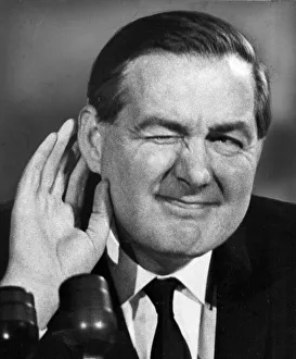 James Callaghan in mock listening pose at press conference - 27th October 1964
