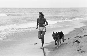 Ocean Prints: James Hunt jogging on beach with his dog Oscar in Marbella 9th May 1979