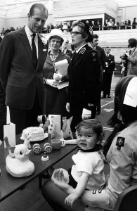 Jamie Burke of Liverpool celebrates his first birthday when Prince Philip visits Grange