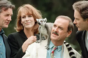 Jamie Lee Curtis, John Cleese (centre in the white jacket and jeans)
