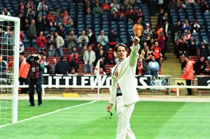 White Suit Prints: Jamie Redknapp waves to the crowd during the pre-match festivities at Wembley for