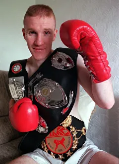 Jan Cree wearing title belts boxing gloves August 1997