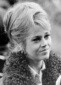 01428 Collection: Jane Fonda smiling in street in Paris, France - 11th December 1965