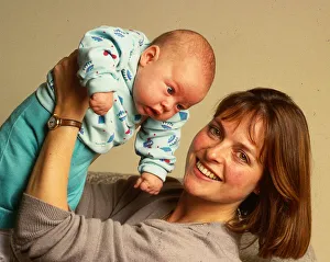 Janet Ellis TV television presenter November 1987 holding baby son Jack in the air