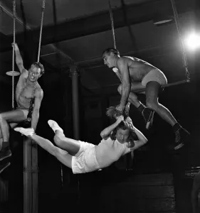 Excercise Prints: Janette Gay, a stunt girl in films, does toughening up exercises in a London gym