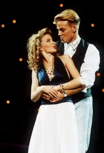 Jason Donovan actor singer arms round Kylie Minogue