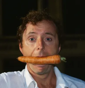 Carrots Prints: Jasper Carrott with raw carrot in his mouth September 1981 A©mirrorpix