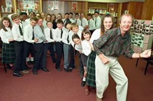 Students Prints: Jasper Carrott receives the £2000 cheque for Comic Relief from pupils at Sir