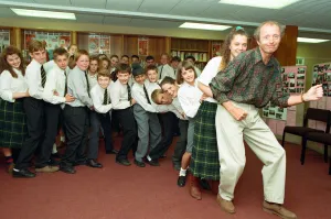 00775 Prints: Jasper Carrott receives the £2000 cheque for Comic Relief from pupils at Sir