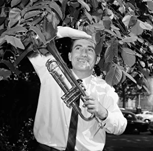 Instrument Prints: Jazz trumpeter Kenny Ball pictured in Londons Embankment gardens during rehearsals