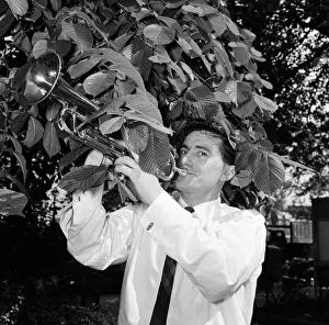 Jazz trumpeter Kenny Ball pictured in Londons Embankment gardens during rehearsals