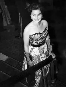 Birthdays Prints: Jean Simmons actress attends party in off the shoulder dress August 1950