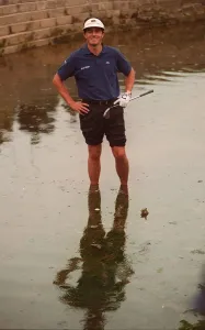 Jean Van de Velde attempts to play from the water on the 18th hole at the 1999 British
