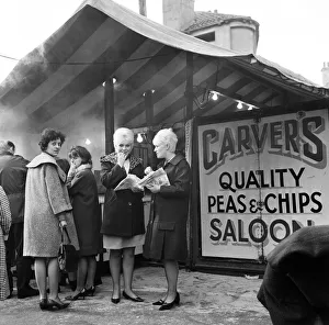 Stalls Prints: Jeanne Stather (22) and Jennifer Fussey (19) enjoy lunch time chips from the open air