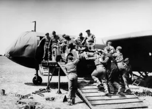 D Day Prints: A jeep is loaded aboard a Airspeed Horsa glider during preparations for Operation