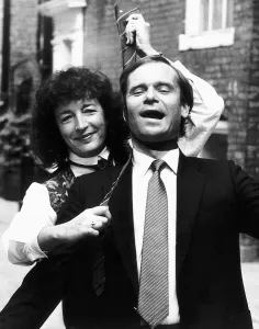 Jeffrey Archer MP elected tie man of the year and author with tv presenter Judith Hann