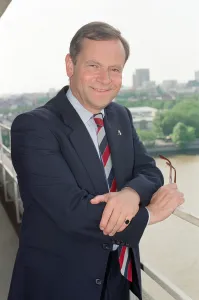 01370 Prints: Jeffrey Archer, pictured on a balcony overlooking the River Thames. 12th June 1992