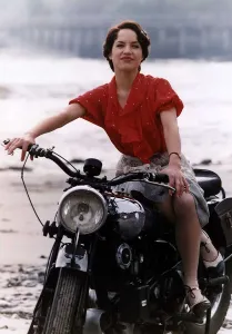 Jennifer Calvert actress siitting astride a motorcycle Appearing in the drama