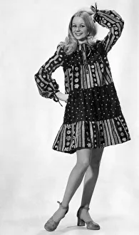 Jenny Clare models this pretty smock frock in rainbow colours by Ossie Clark for Radley