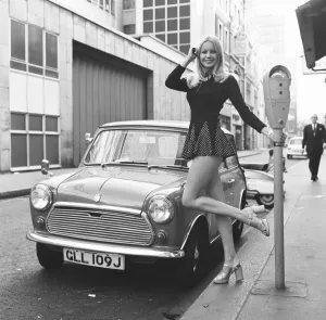 Jenny Clare seen here posing with her Leyland Mini 6th October 1972