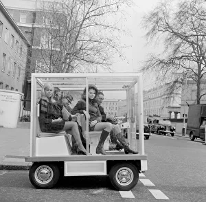 Jenny Hopkirk with her friend Sue Winchester (right) as they are driven around