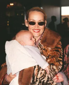 Jerry Hall with baby Gabriel March 1998 At Heathrow Airport