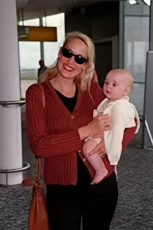 Images Dated 3rd June 1998: Jerry Hall Model June 98 Arriving at heathrow airport from Nice with her new baby