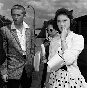 Images Dated 7th August 2019: Jerry Lee Lewis and his 13-year-old wife Myra (centre) at London Airport to fly home