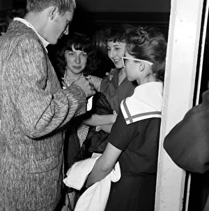 01319 Prints: Jerry Lee Lewis and his 13-year-old wife Myra at London Airport to fly home