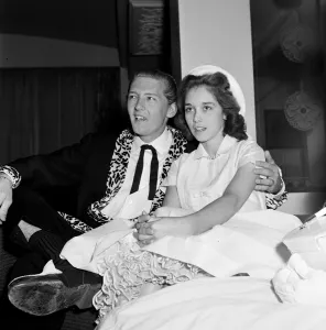 01319 Prints: Jerry Lee Lewis and his 13-year-old wife Myra at the Westbury Hotel, London