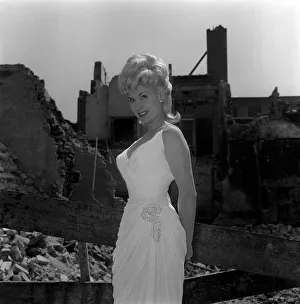 Jill Day actress singer June 1962 poses at demolished bomb site