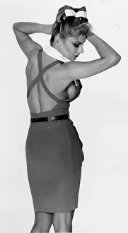 Jilly Johnson glamour model 1988 in backless dress showing breast has had implants