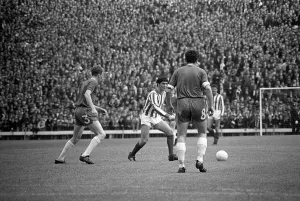 00247 Prints: Jim Baxter runs around the Celtic defence in sunderland colours for the first time when