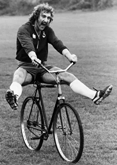 Bike Prints: Jim Cannon of Crystal Palace riding a bicycle during a training session