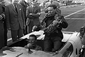Jim Clark formula one motor racing driver April 1963 holding cup with laurel