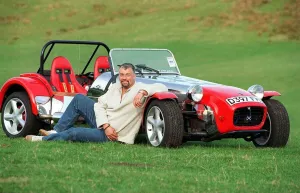 Convertible Prints: JIM THOMPSON WITH HIS LOTUS 7 KIT CAR SEPTEMBER 1997 SITTING AGAINST CAR