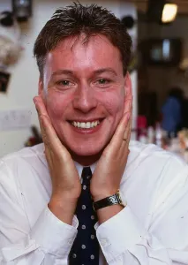 Presenters Prints: Jim White with his hands on his face after having moustache shaved off August 1988