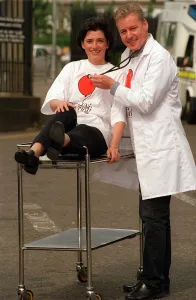 Jim white tv presenter pic shows jim white s. t. v presenter gives elaine anderson a few